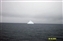 Tall iceberg in the distance