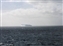 Another huge iceberg in the distance