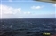 Luckily this giant iceberg is a distance away