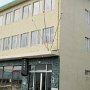 Vestmannaeyjar - Hotel Vestmannaeyjar (our room is behind the center flag poles)