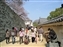 Walk along the outer walls with defenses on the other side