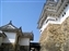 Tall stone walls and guard towers abound