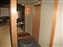 Left door to large room, middle to small room, wood door to bath