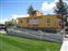 Caboose outside of train station/museum